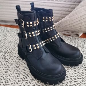 Studded black combat boots